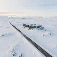 Arctic Circle Centre building beside the E6 on the snowy Saltfjellet plateau