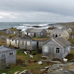 Weathered wooden houses in the abandoned fishing village of Hamningberg on the Varanger coast